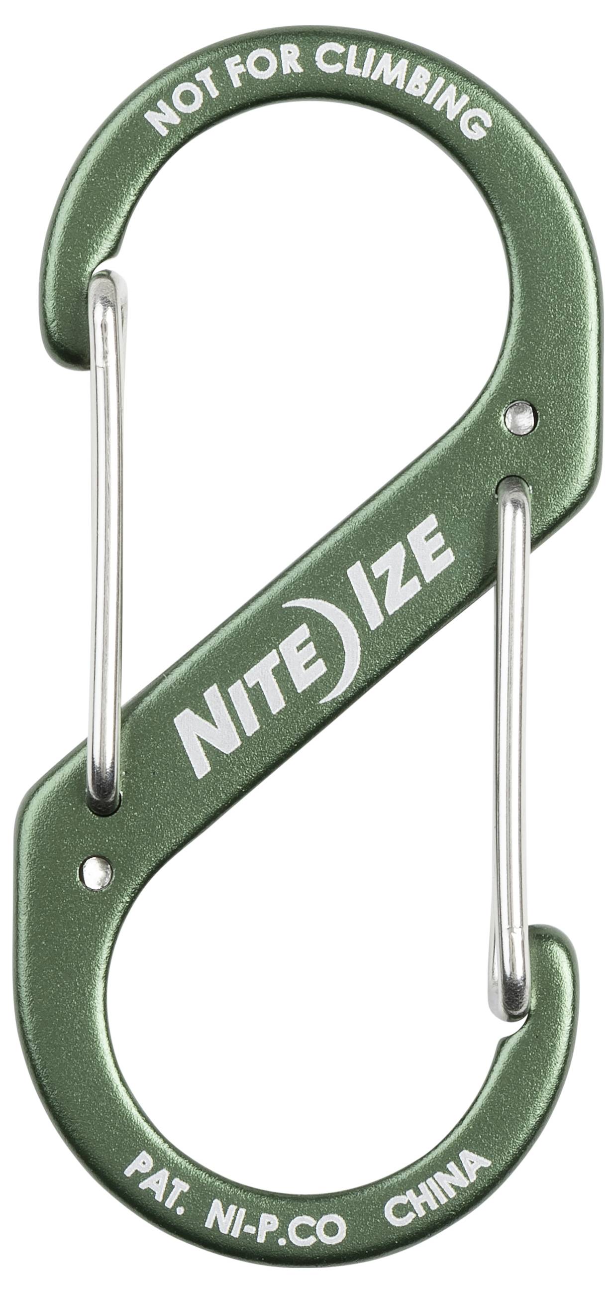 Grüner S-förmiger Karabiner mit 'Nite Ize' Logo, gekennzeichnet mit 'NICHT ZUM KLETTERN GEEIGNET'. Metalltüren an beiden Enden.