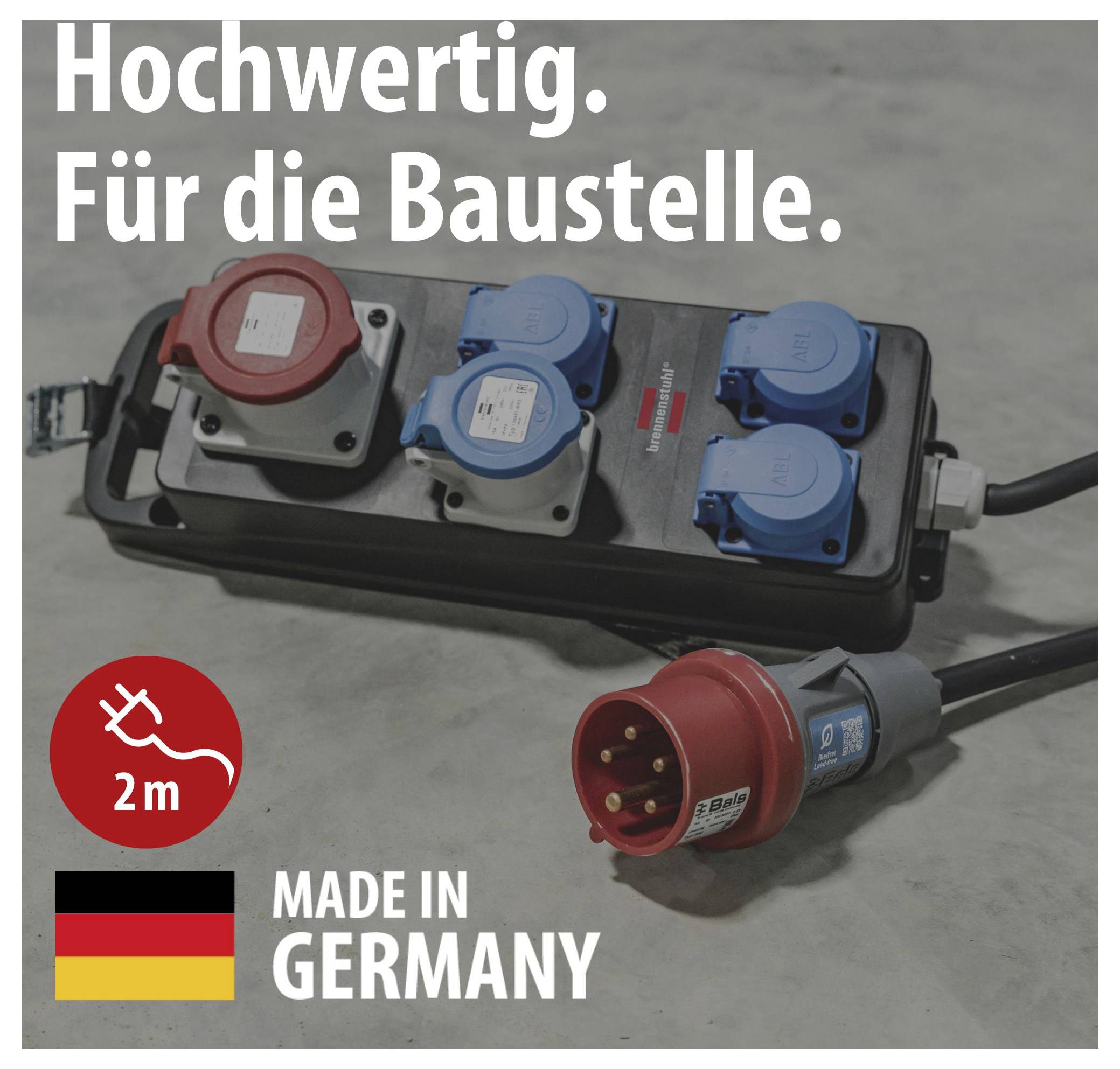 Werbeabbildung einer robusten Baustellen-Stromverteilerbox mit roten und blauen Steckdosen; Text: 'Hochwertig. Für die Baustelle.', '2 m', 'MADE IN GERMANY'.