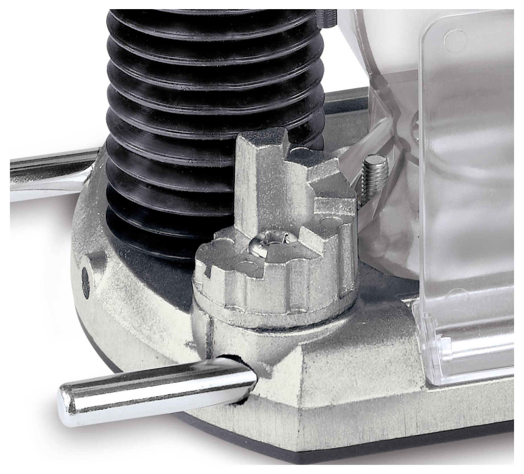 Eine Nahaufnahme einer metallischen Werkzeugkomponente mit einem strukturierten Knopf und Zylinder, die höchstwahrscheinlich Teil einer mechanischen oder industriellen Vorrichtung ist.