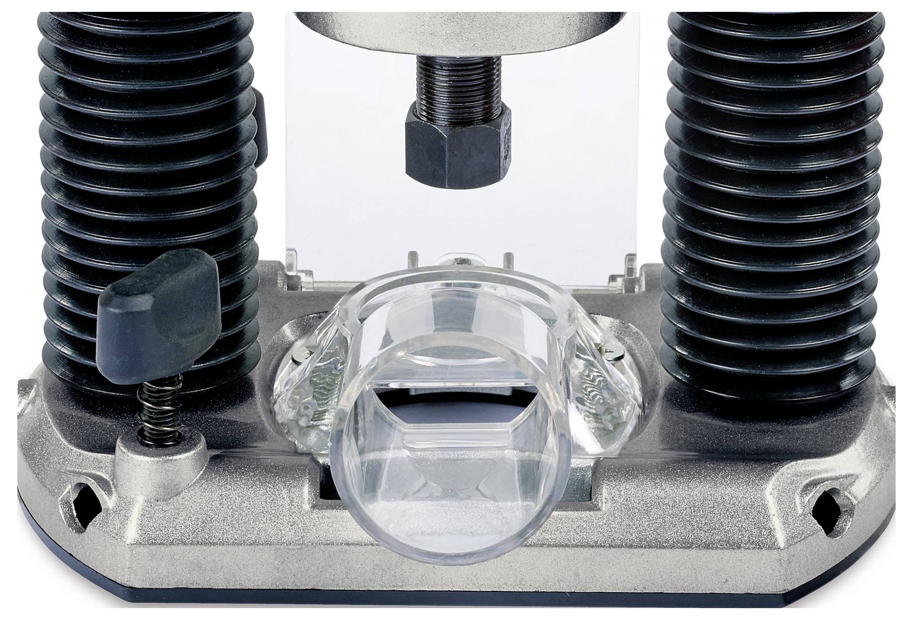 Nahaufnahme einer Metallmaschinenbaukomponente mit einem transparenten kreisförmigen Stück in der Mitte unter zwei großen Schrauben, die auf eine Apparatfunktion hinweist.