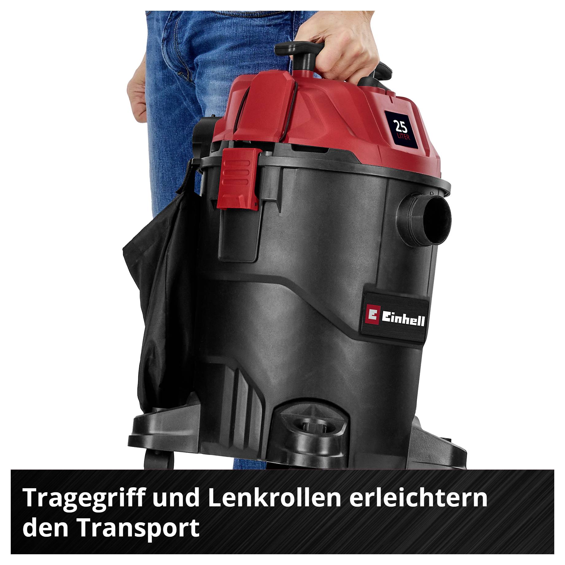 Einhell Staubsauger mit rotem Oberteil und schwarzem Körper. Eine Person hält den Staubsauger am Tragegriff.