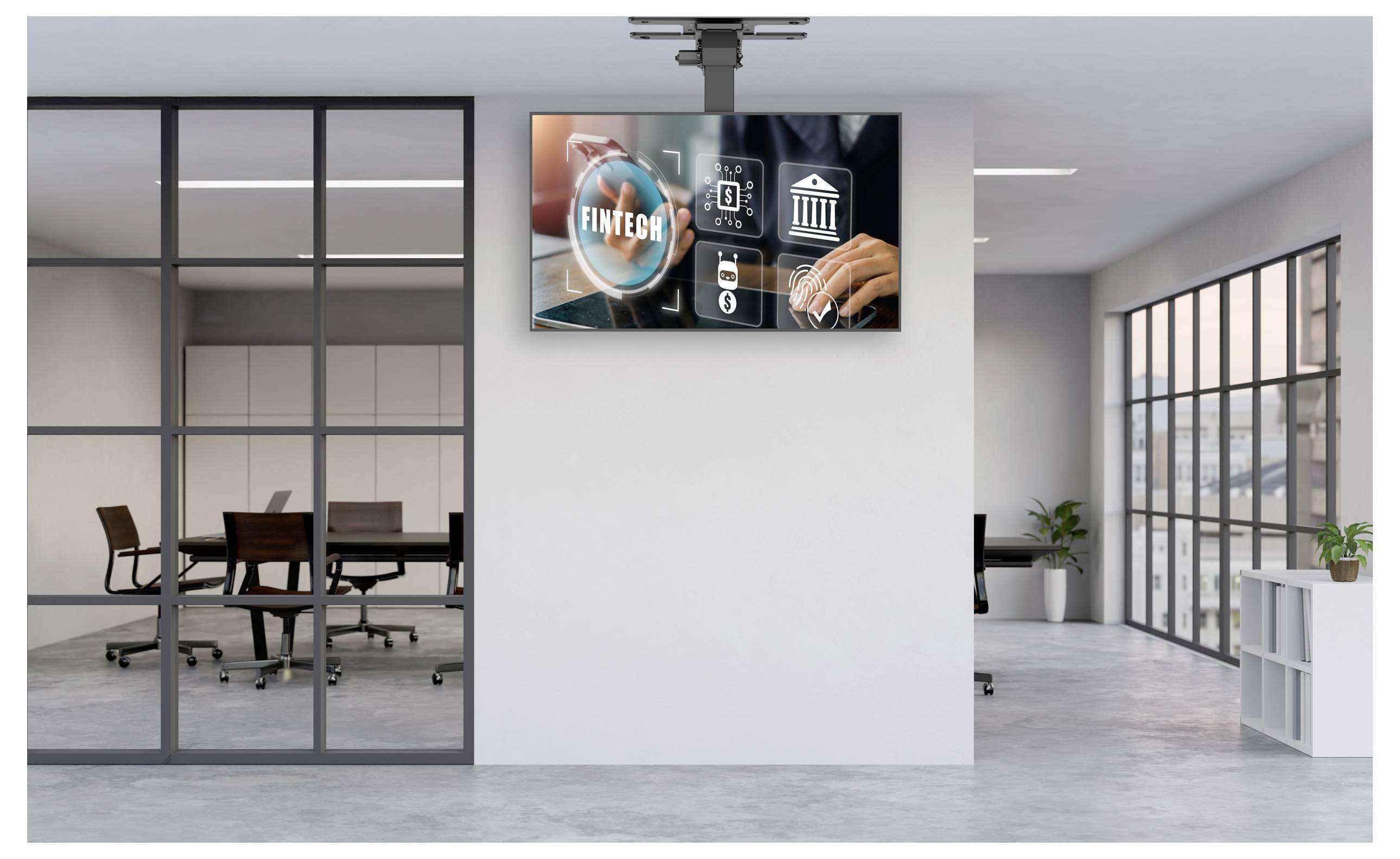 Bürobesprechungsraum mit einem wandmontierten Bildschirm, auf dem 