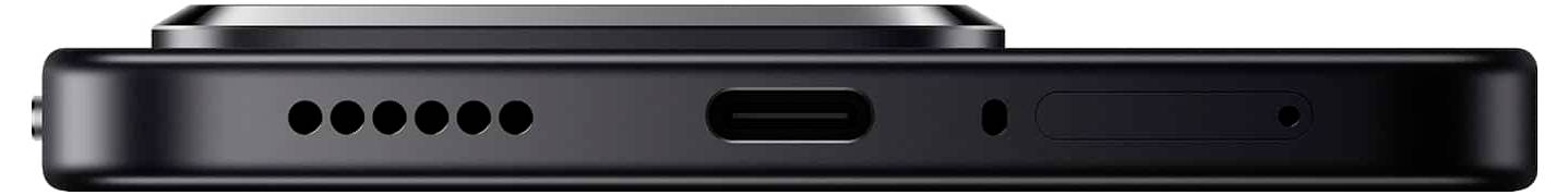 Ein Nahaufnahmebild der Unterseite eines Smartphones zeigt den USB-C-Anschluss, Lautsprecheröffnungen und einen möglichen Mikrofon- oder SIM-Kartenschacht.