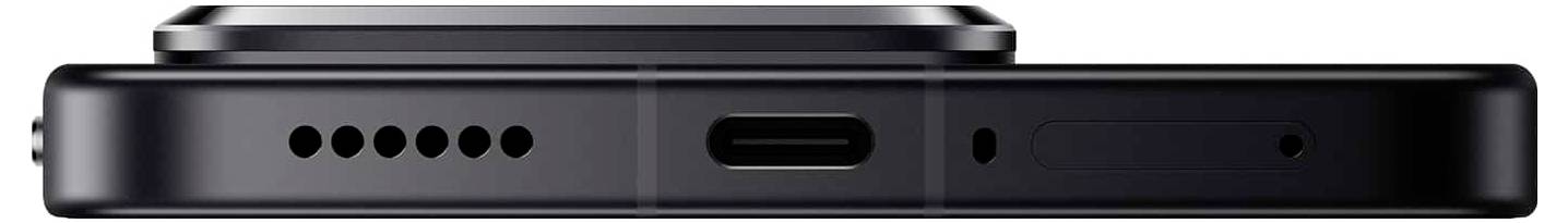 Nahaufnahme einer Smartphone-Seitenansicht mit Lautsprecher, USB-C-Anschluss und Mikrofonlöchern in elegantem Schwarz.