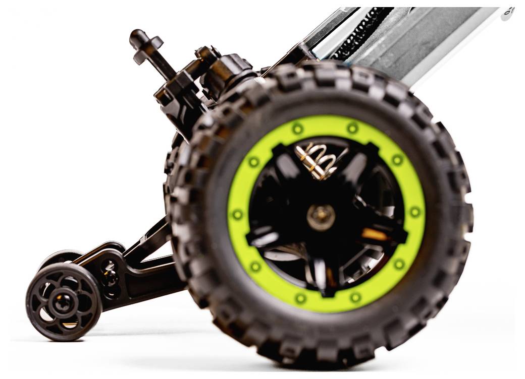 Nahaufnahme eines robusten Spielzeugfahrzeug-Reifens, der einen großen schwarzen Reifen mit hellgrüner Einfassung zeigt und dabei das robuste Design und die Mobilität betont.