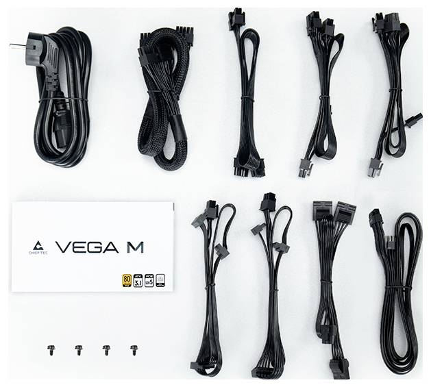 Netzkabel und Schrauben des 'VEGA M' Netzteils sind übersichtlich auf einer ebenen Fläche angeordnet und zeigen verschiedene Anschlusstypen für die Installation.