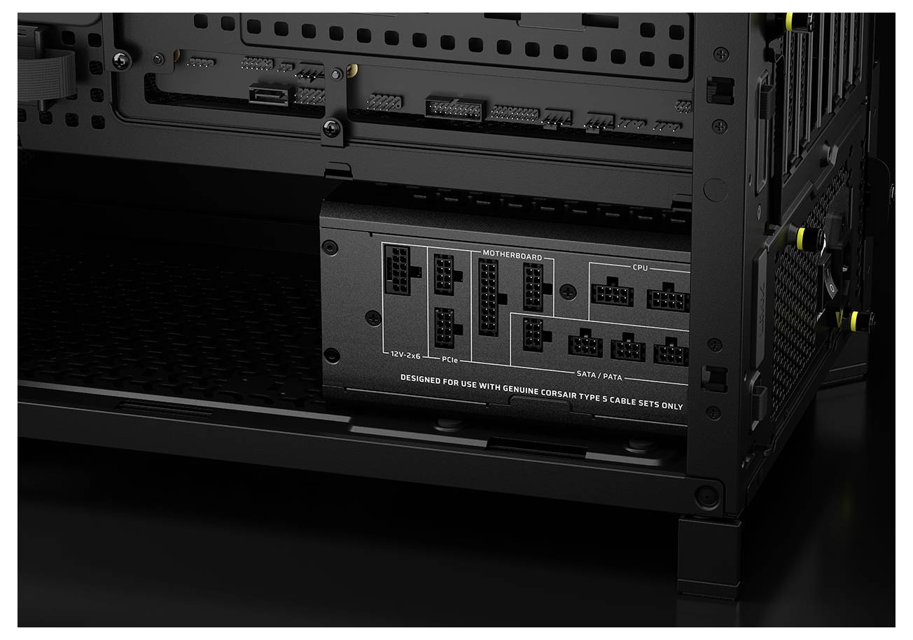 Eine Nahaufnahme eines Computer-Netzteils mit verschiedenen beschrifteten Eingabe- und Ausgabeanschlüssen, einschließlich Optionen für CPU und Peripheriegeräte.