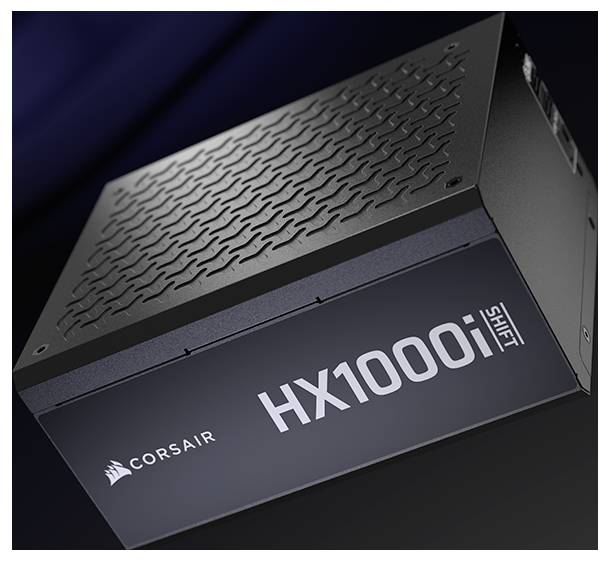 'Corsair HX1000i Shift' Netzteil in einer schrägen Ansicht, das die strukturierte Oberseite und das Etikett zeigt, vor einem dunklen Hintergrund.