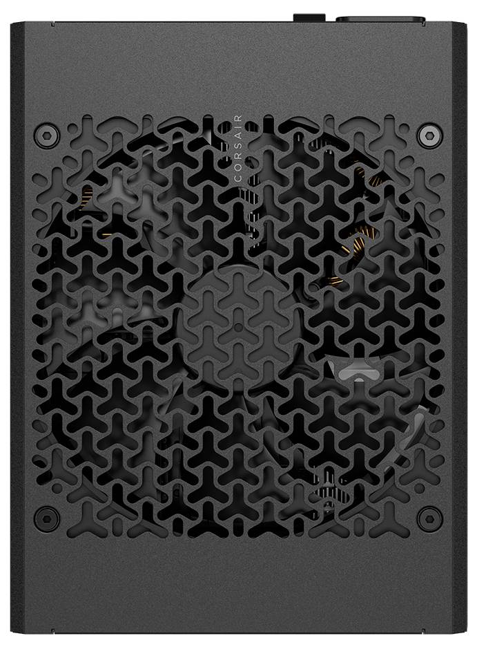 Corsair RMx Serie Netzteil Draufsicht, die einen großen Lüfter durch eine gelochte Abdeckung mit einem einzigartigen Kühlmuster zeigt.