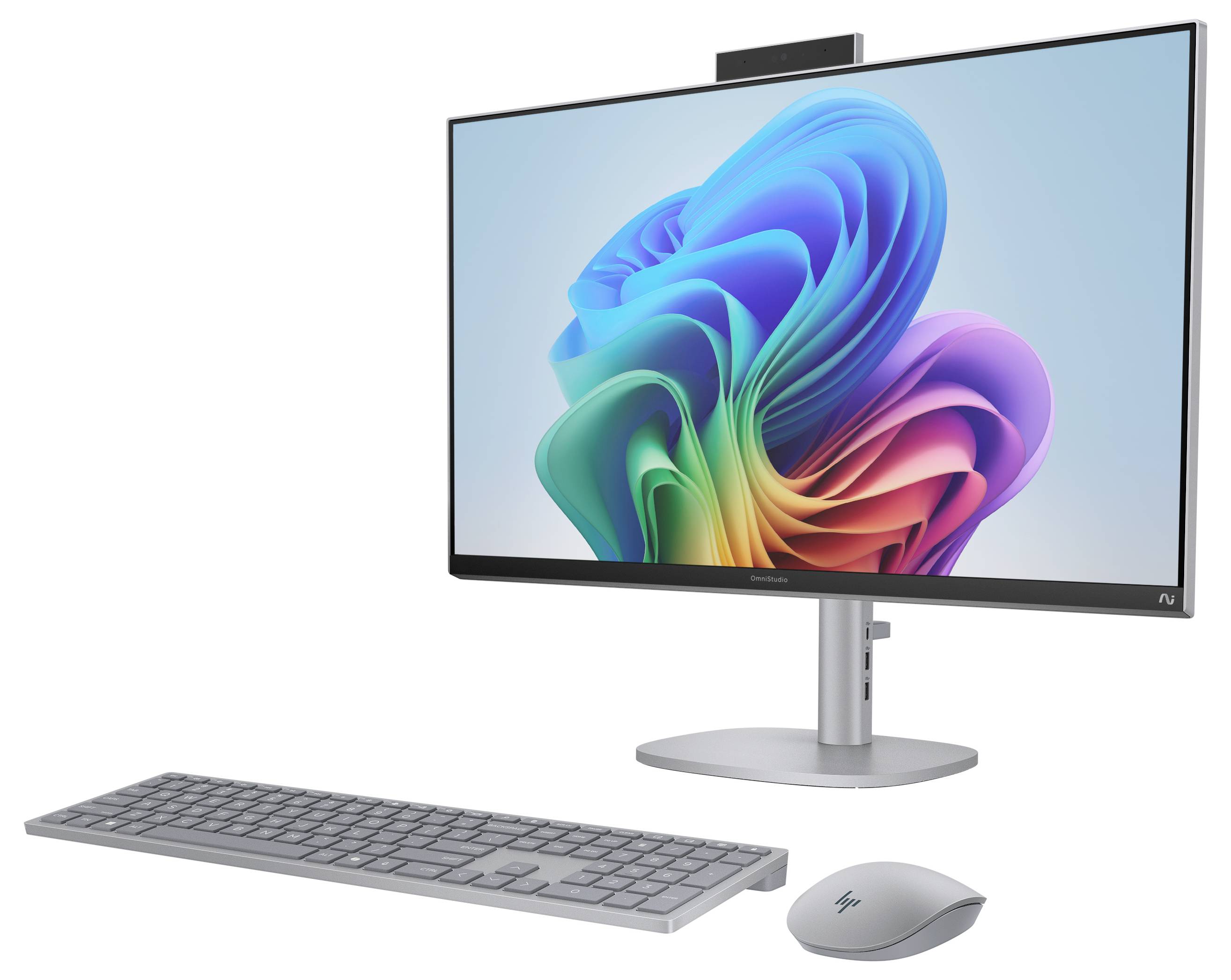 Ein schlanker All-in-One-Desktop-Computer mit einem farbenfrohen Wirbel auf dem Bildschirm, grauer Tastatur und Maus, geeignet für Bürogebrauch.