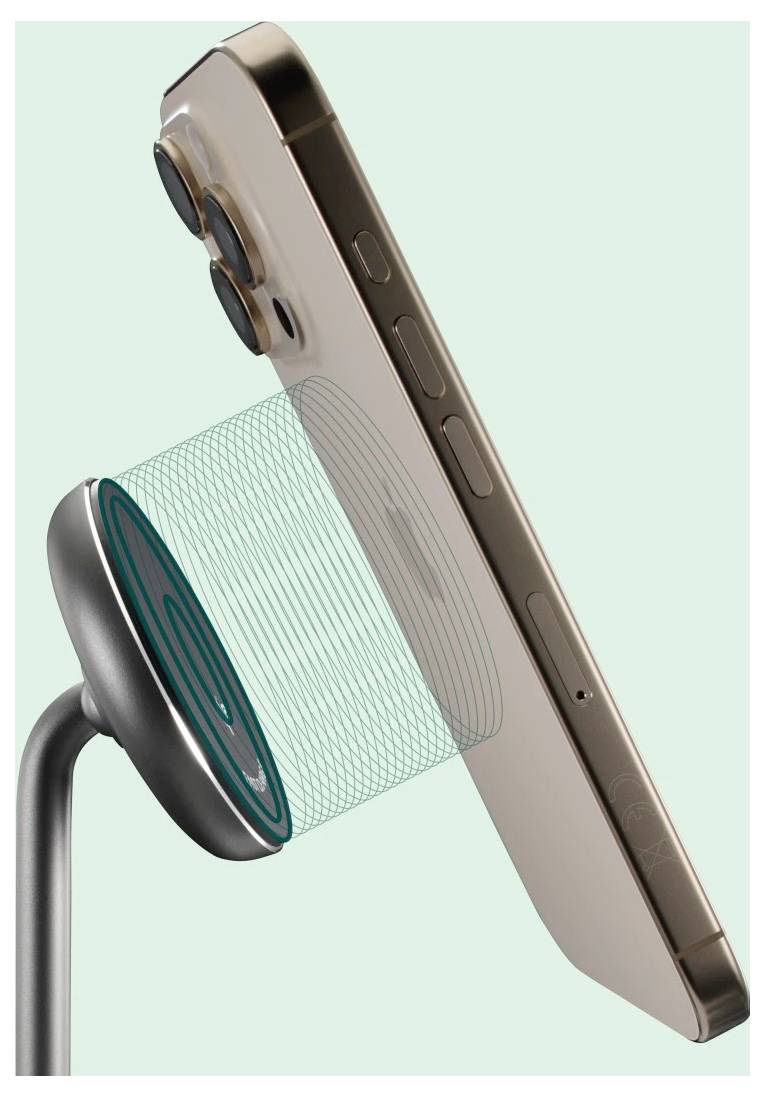 Ein Smartphone ist an einem Magnetständer befestigt, aufrecht auf einem hellgrünen Hintergrund, der die drahtlose Ladefähigkeit hervorhebt.
