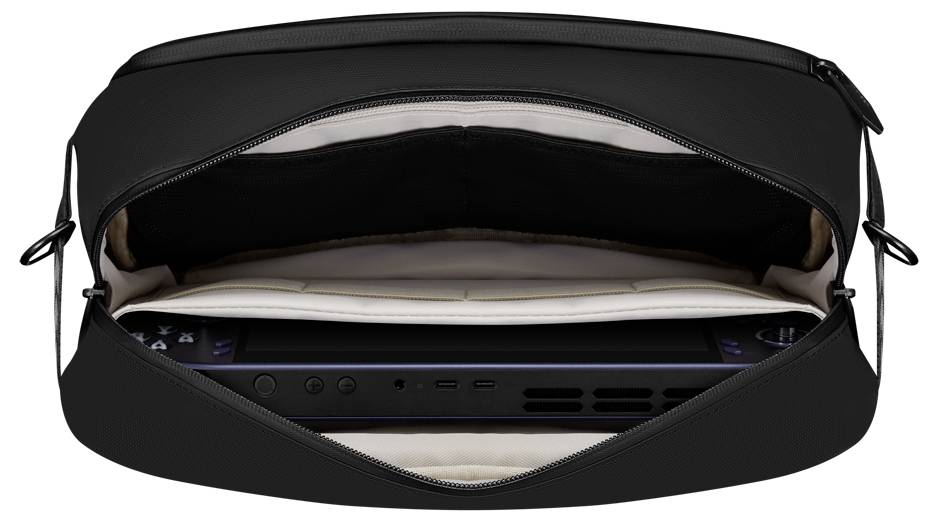 Eine schwarze Tasche ist geöffnet und gibt eine tragbare Spielkonsole im Inneren preis. Die Konsole ist teilweise sichtbar, wobei ihre Tasten und der Bildschirm zu erkennen sind.