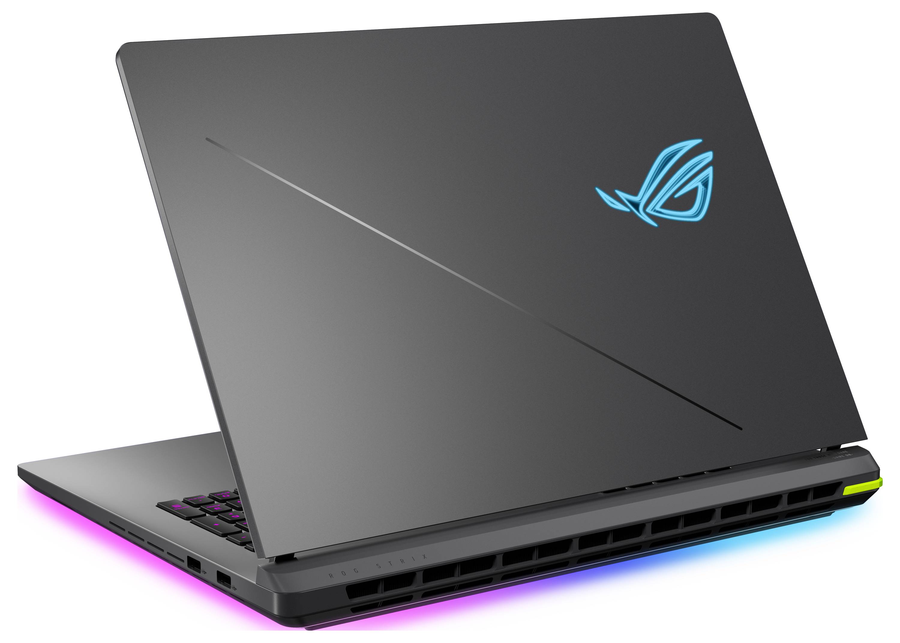 Ein schlankes Gaming-Laptop mit einem leuchtenden Logo auf der Rückseite, ausgestattet mit mehrfarbiger Beleuchtung entlang der Basis und sichtbaren Anschlüssen an der Seite.