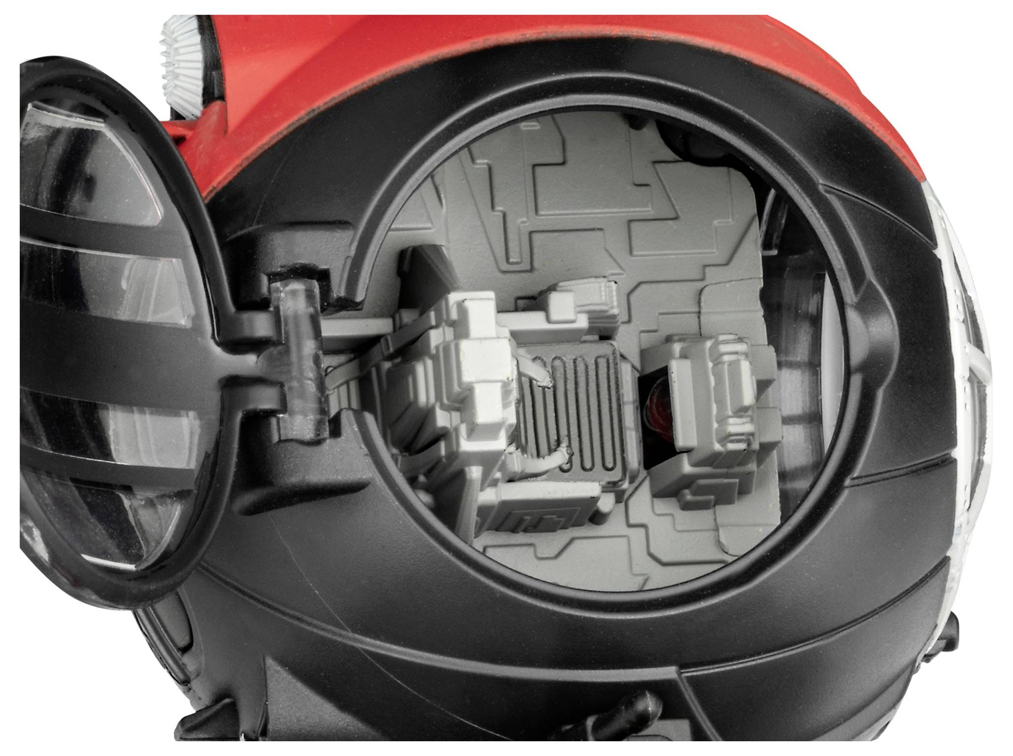 Das Bild zeigt die Innenansicht eines bunten sphärischen Spielzeugs und offenbart dessen komplexe, labyrinthartige Struktur.