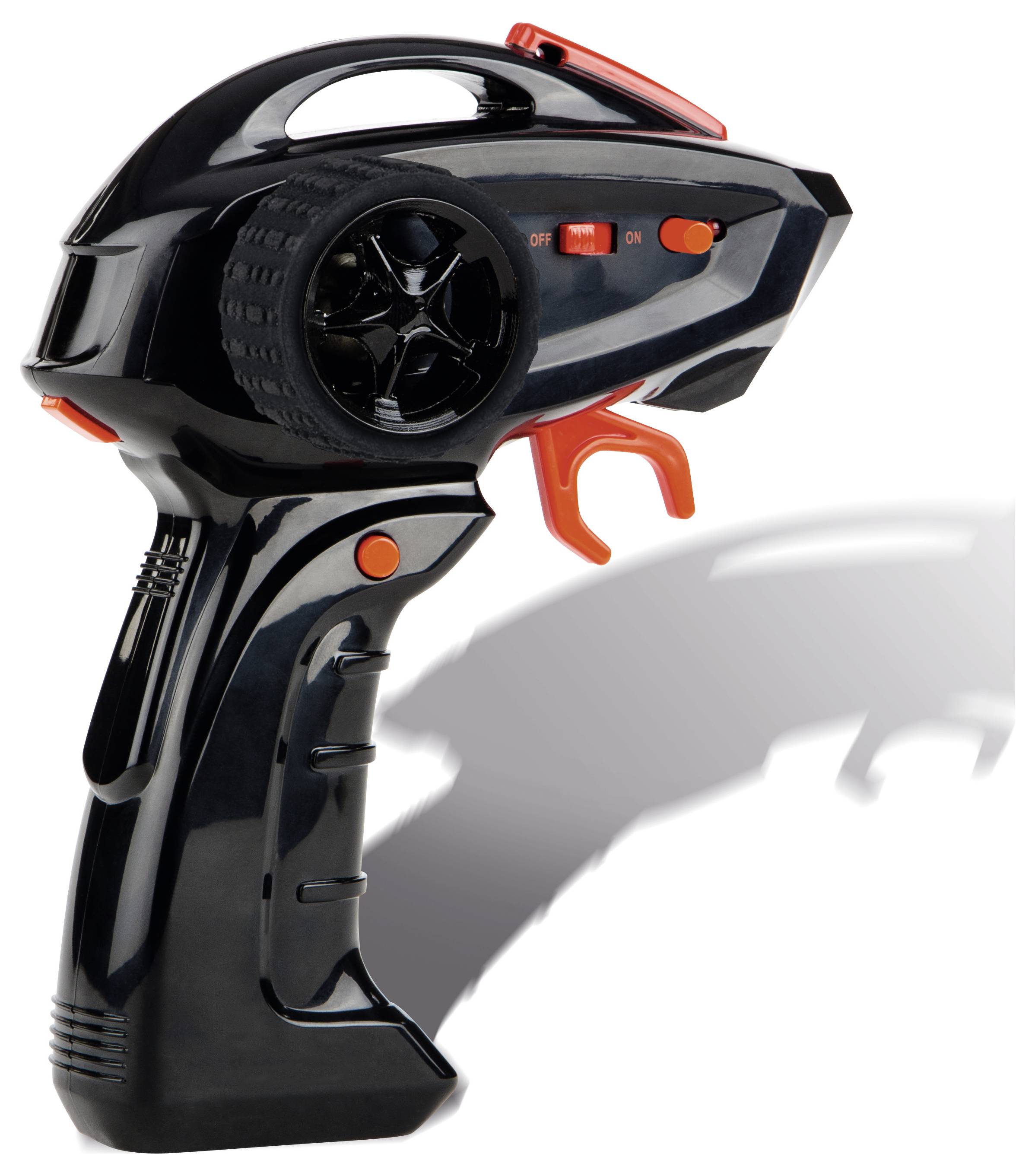 Eine schwarze und orangefarbene Spiel-Fernbedienung mit einem runden Rad, Auslöseknopf und Kontrollschaltern, wahrscheinlich für ein ferngesteuertes Fahrzeug.