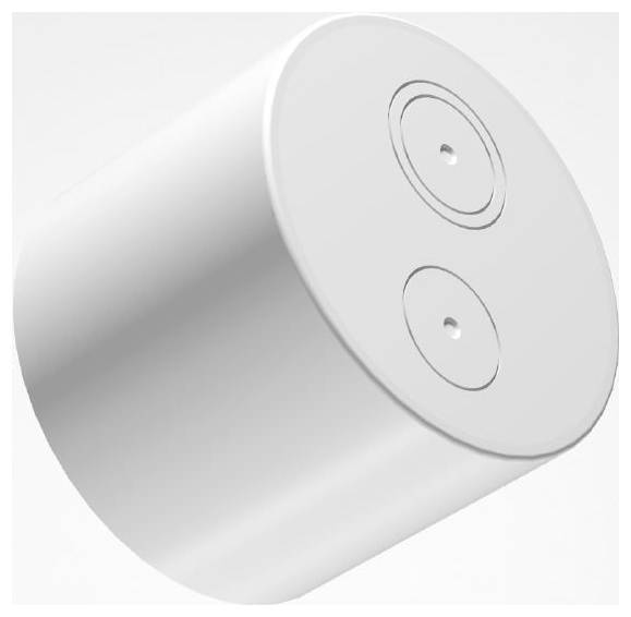 Ein zylindrisches Metallobjekt mit zwei vertieften Kreisen auf seiner Oberfläche, möglicherweise Steckdosen oder Verbindungspunkte anzeigend.