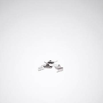 Ein minimalistisches Foto einer Deckenleuchte von oben gegen einen einfachen weißen Hintergrund.