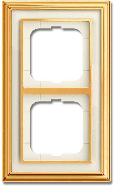 Ein leerer Doppelsteckdosen-Rahmen mit goldenem Rand, konzipiert für zwei nebeneinander angeordnete Stromdosen oder Schalter in einer Wand.