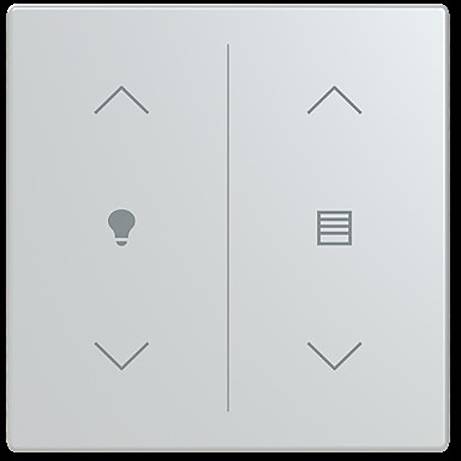 Ein Lichtschalter-Panel mit zwei Abschnitten: linke Seite zur Lichtsteuerung mit einem Glühbirnen-Symbol und rechte Seite zur Jalousiensteuerung mit Pfeil-Symbolen.