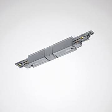 Ein graues, längliches elektronisches Gerät mit Steckverbindern oder Anschlüssen an beiden Enden, vor einem neutralen Hintergrund.
