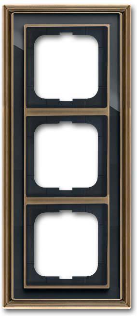 Ein rechteckiger Metallrahmen mit drei vertikal angeordneten Schlitzen für Schalter- oder Steckdosenabdeckungen, geeignet zur Innenwandmontage.