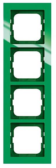 Ein grüner vierfach-Schalterrahmen für die Wandmontage mit leeren Plätzen, vertikal angeordnet.