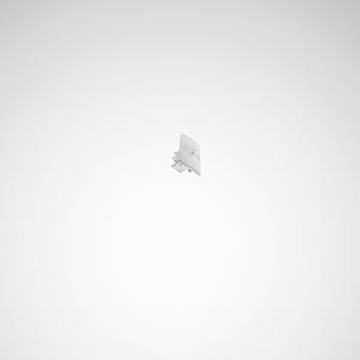 Eine kleine, weiße Wandplatte mit einem Schalter oder einer Steckdose ist gegen einen schlichten, hellgrauen Hintergrund zentriert.