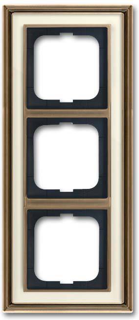 Ein vertikales rechteckiges dreifaches Lichtschalter-Rahmen mit drei quadratischen Öffnungen. Der Rahmen ist aus Bronze mit schwarzer innerer Auskleidung.