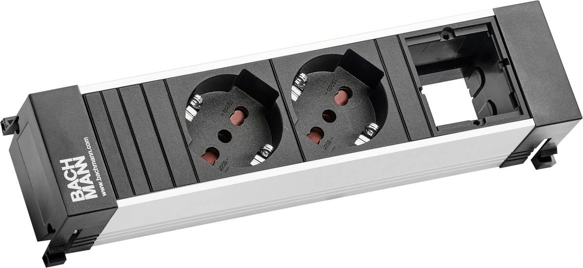 Schwarze Bachmann-Steckerleiste mit zwei runden europäischen Steckdosen und zwei leeren Steckplätzen in einem Metallgehäuse, in schräger Ansicht gezeigt.