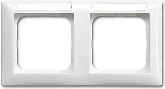 Eine weiße Doppelschalterblende mit zwei leeren Aussparungen, verwendet zur Aufnahme von Lichtschaltern oder Steckdosen.