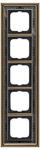 Ein an der Wand montierter Raumthermostat mit einem zentralen Drehknopf, gekennzeichnet als „Raumtemperaturregler