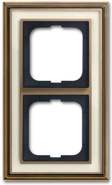 Zwei leere, rechteckige, vertikale Lichtschalterrahmen mit bronzefarbener Umrandung und schwarzer Innenauskleidung auf weißem Hintergrund