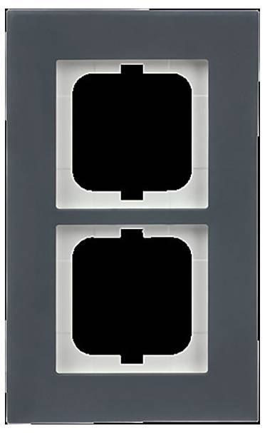 Ein dreiteiliges Elektrobauteil-Set: schwarze quadratische Grundplatte, weißer Doppelschalter und schwarzer Montagrahmen zur Wandmontage.