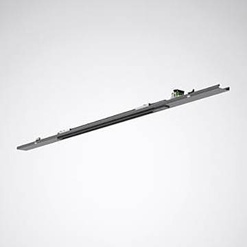 Ein längliches Metallobjekt mit elektronischen Komponenten, wahrscheinlich ein Hardwaregerät oder ein Teil, vor einem einfachen grauen Hintergrund.