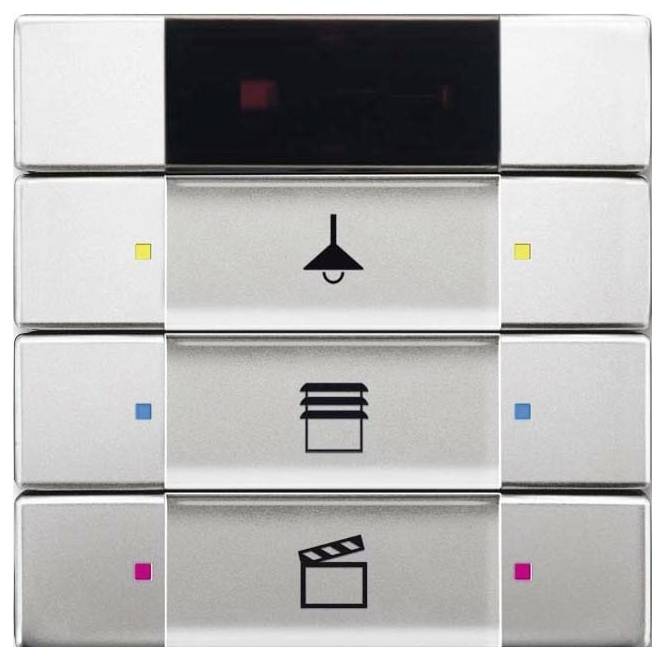 Vier vertikale übereinander angeordnete rechteckige Schaltflächen, jede mit unterschiedlichen Symbolen: eine Lampe, Jalousien und eine Filmklappe, die Kontrollfunktionen suggerieren.