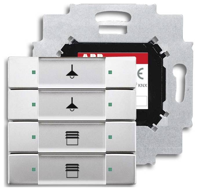 Ein Lichtschalter-Panel mit sechs Tasten, einschließlich Symbolen für Lampen und einen Ventilator. Das Panel ist metallisch, mit grünen Anzeigelichtern.