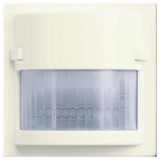 Ein an der Wand montierter weißer Bewegungsmelder mit rechteckiger Linse, der zur Bewegungserkennung konzipiert ist und häufig für Sicherheit oder Beleuchtungssteuerung verwendet wird.