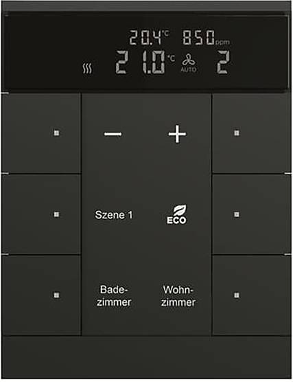 Ein runder schwarzer eingelassener Deckenspot mit reflektierendem Inneren, zentriert vor einem einfachen Hintergrund.
