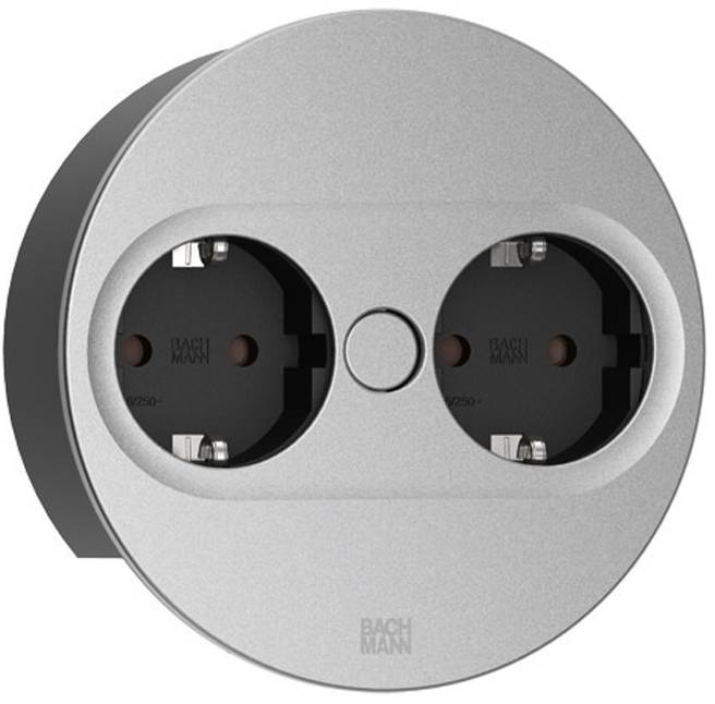 Eine runde, metallische Doppelsteckdose mit 