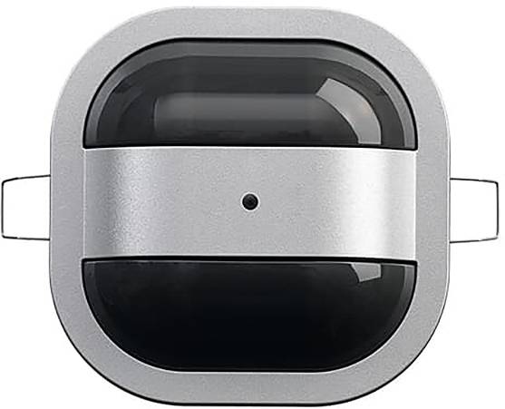 Draufsicht auf ein silbernes und schwarzes Kopfhörer-Ladeetui mit einer zentralen Anzeigelampe und rechteckigem Design.