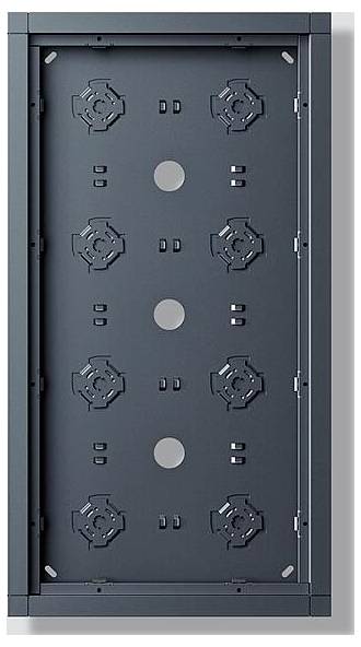 Ein Metallpanel mit kreisförmigen und rechteckigen Ausschnitten, symmetrisch angeordnet. Es scheint sich um ein Gehäuse für elektrische oder Netzwerkkomponenten zu handeln.