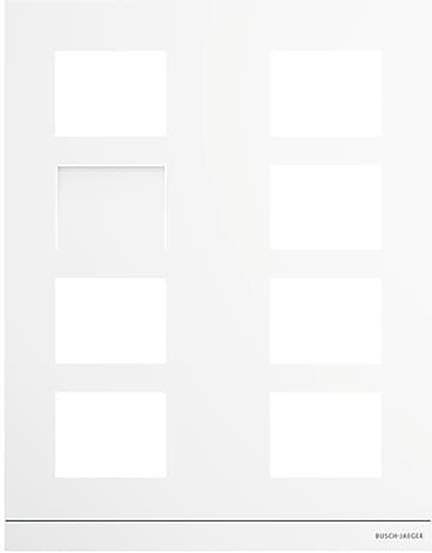 Ein weißer Schalterpanelrahmen mit Platz für mehrere Schalter, hergestellt von Busch-Jaeger, konzipiert für elektrische Installationen.