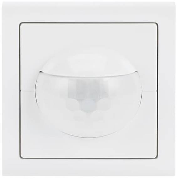 Ein weißer Bewegungsmelder an einer Wand, entwickelt, um Bewegungen für Sicherheits- oder Automatisierungszwecke zu erkennen.