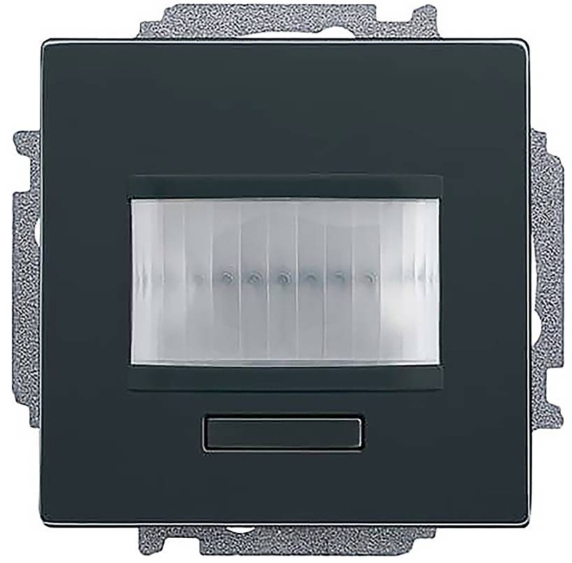 Quadratischer Bewegungsmelderschalter mit dunklem Rahmen und durchsichtigem Kunststoffabdeckung, montiert auf einer Metallplatte.