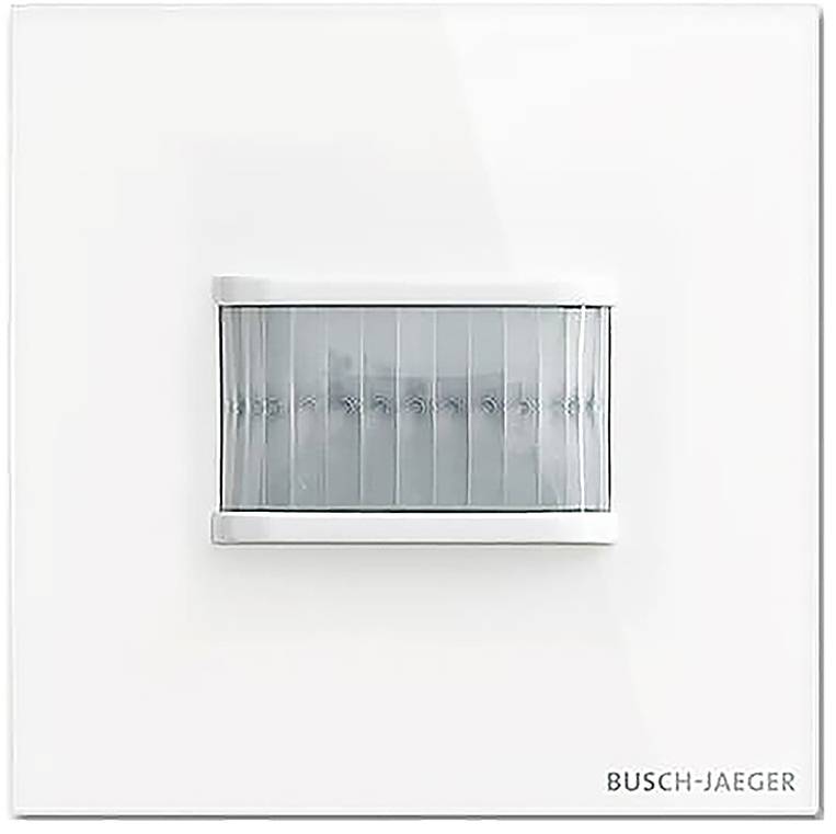 Ein weißer Busch-Jaeger Bewegungsmelder mit rechteckigem Design auf einer glatten Oberfläche.