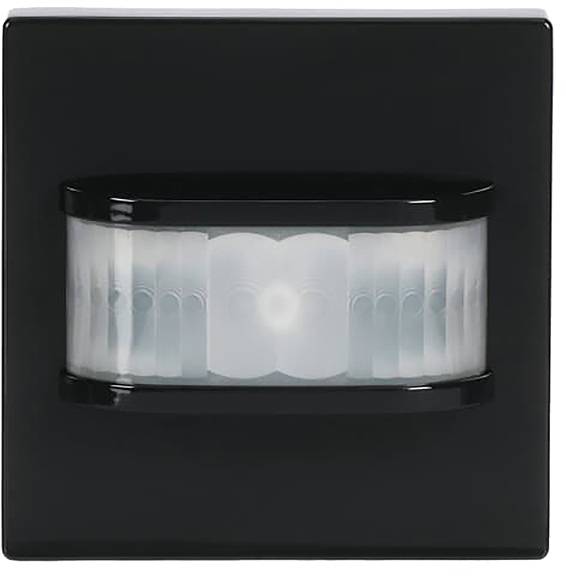 Ein schwarzer rechteckiger Bewegungsmelder mit einem weißen Erkennungspanel in der Mitte seiner Oberfläche.