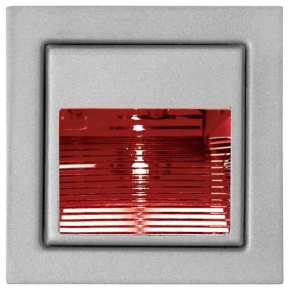 Roter beleuchteter Wandschalter oder Anzeigelampe in einer gebürsteten Metallplatte.
