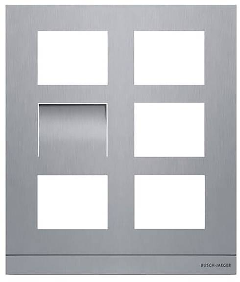 Ein Edelstahlrahmen mit sechs rechteckigen Ausschnitten und einer kleinen zentralen Vertiefung. Die Beschriftung in der unteren rechten Ecke lautet BUSCH-JAEGER.