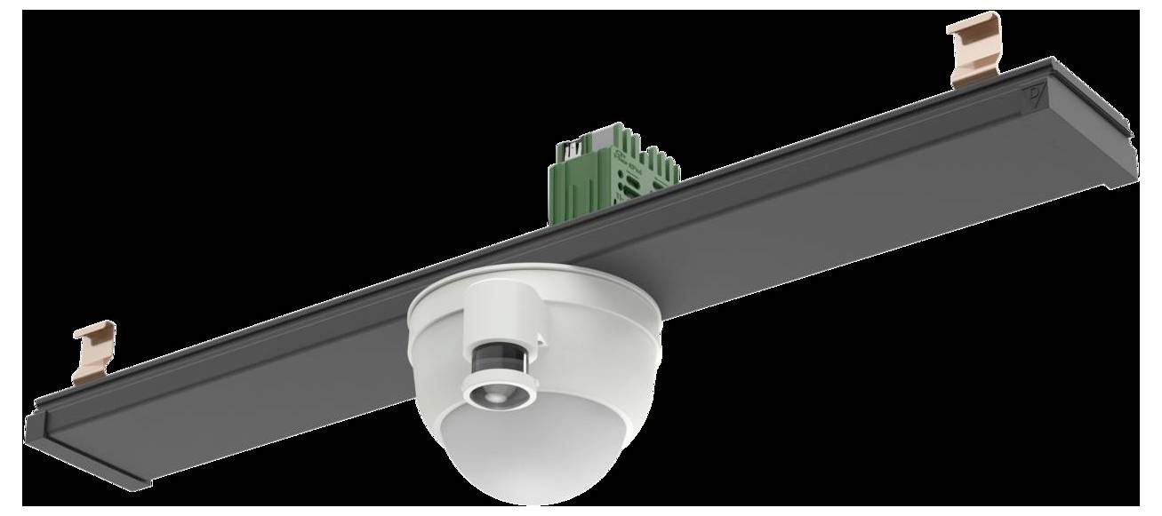 Ein Sensor, der auf einem schwarzen rechteckigen Balken mit Kupferklemmen und einem grünen Anschlussblock montiert ist.