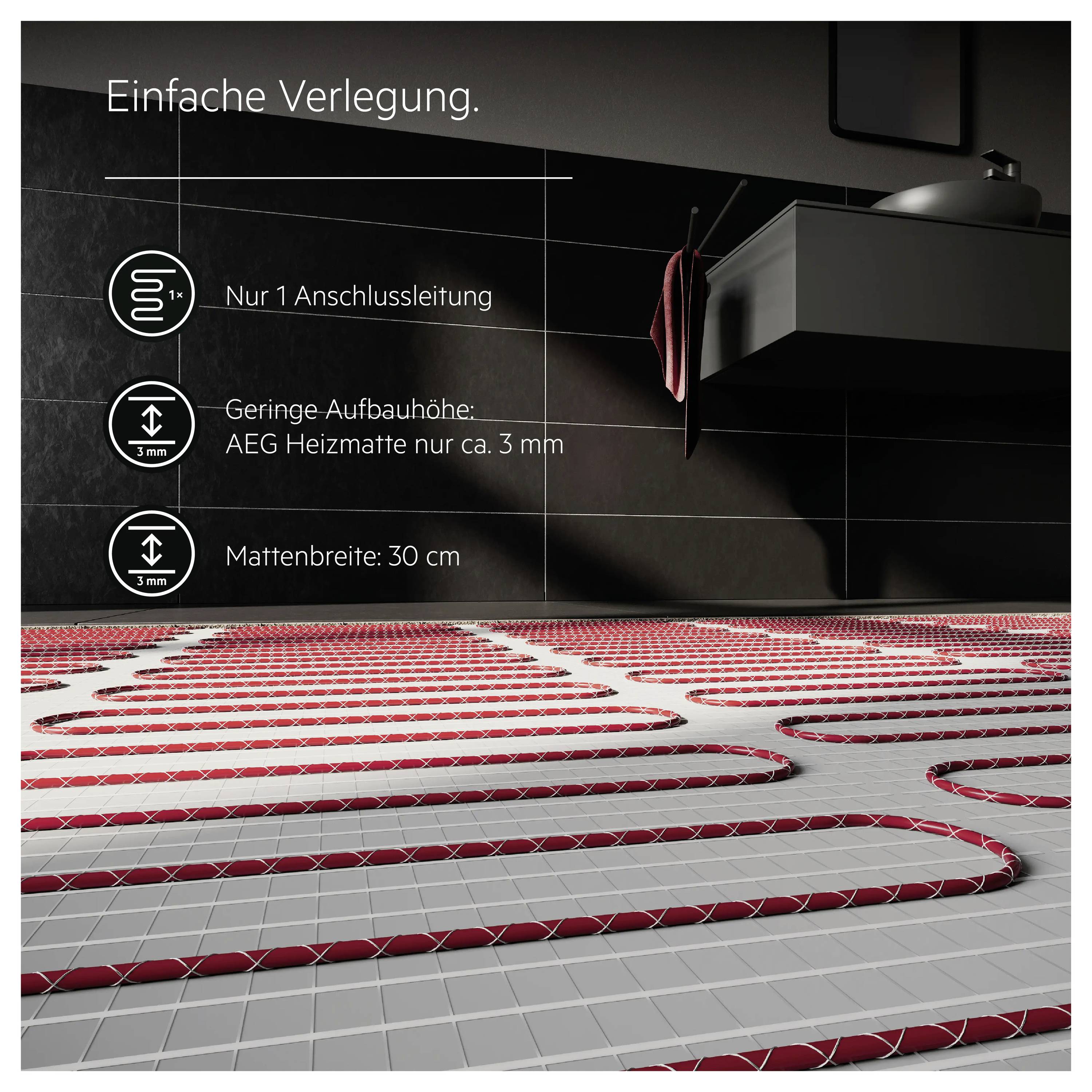 Heizmatten in Bad für einfache Verlegung. Nur 1 Anschlussleitung, Aufbauhöhe ca. 3 mm, Mattenbreite 30 cm.